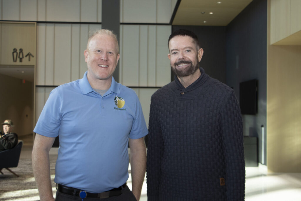 Devin Strecker, River District; and Tim Padden, SMUD; pose for a photo at the May Lee State Office Complex. 